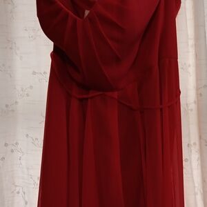 2 dresses never worn and a pair of boots never worn